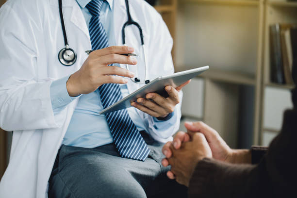 A doctor consulting with a patient